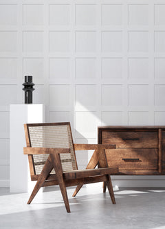 A chart titled “How Much Ashley Stark Home Chase Wood Peel and Stick Wallpaper?” by WallPops displays a grid for estimating the number of wallpaper rolls needed based on wall length 6–46 ft and ceiling height 8–12 ft, with small diagrams showing how to measure each. Each roll covers 30.75 sq ft.