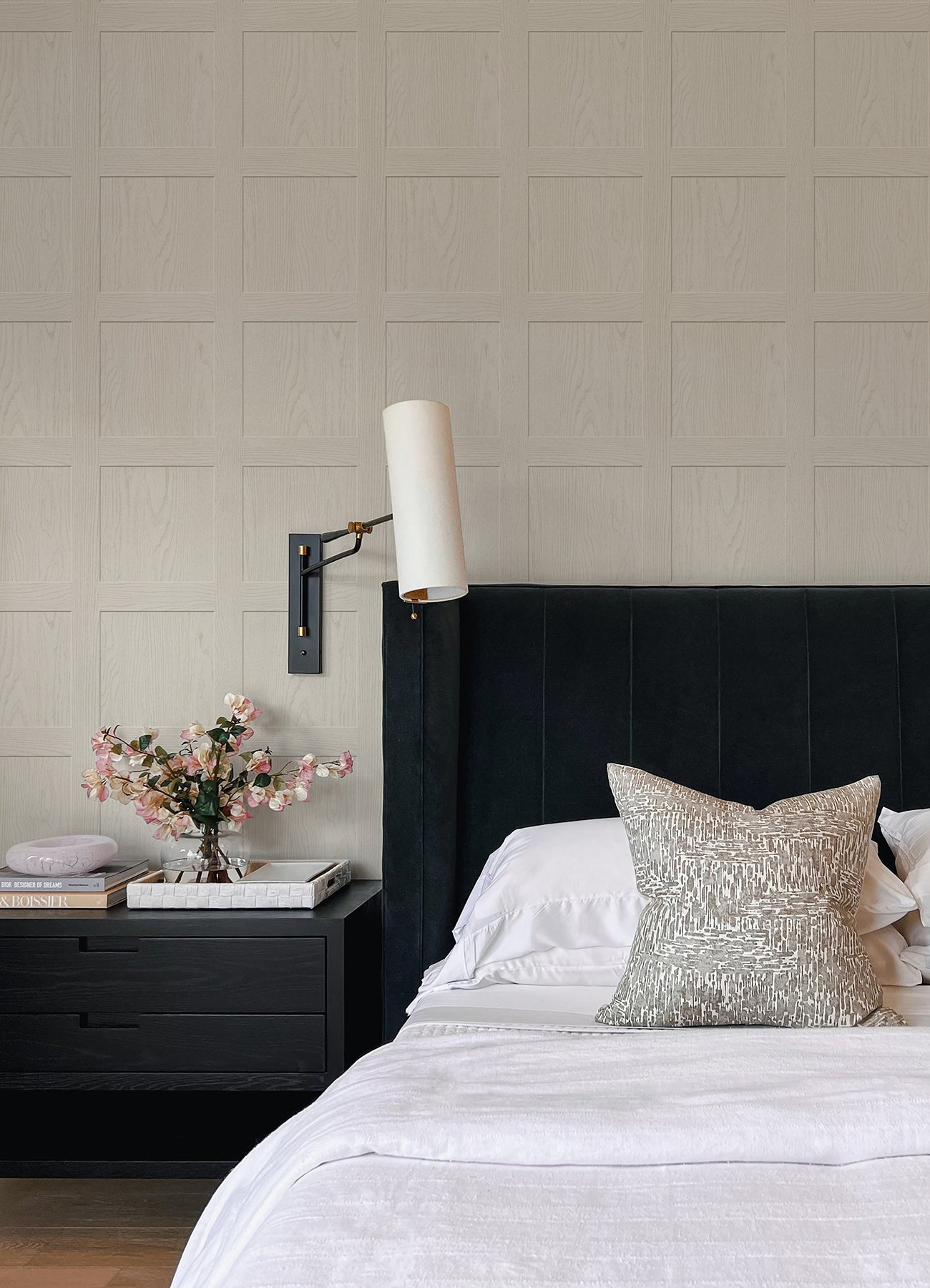 A chart titled “How Much Ashley Stark Home Chase Wood Peel and Stick Wallpaper?” by WallPops displays a grid for estimating the number of wallpaper rolls needed based on wall length 6–46 ft and ceiling height 8–12 ft, with small diagrams showing how to measure each. Each roll covers 30.75 sq ft.