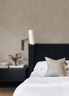 Featuring a pattern of overlapping black geometric shapes—rectangles, semicircles, and squares—set against a dark background, the Ashley Stark Home Bas Geometric Peel and Stick Wallpaper by WallPops creates a subtly textured effect with its nearly indistinguishable monochromatic design.