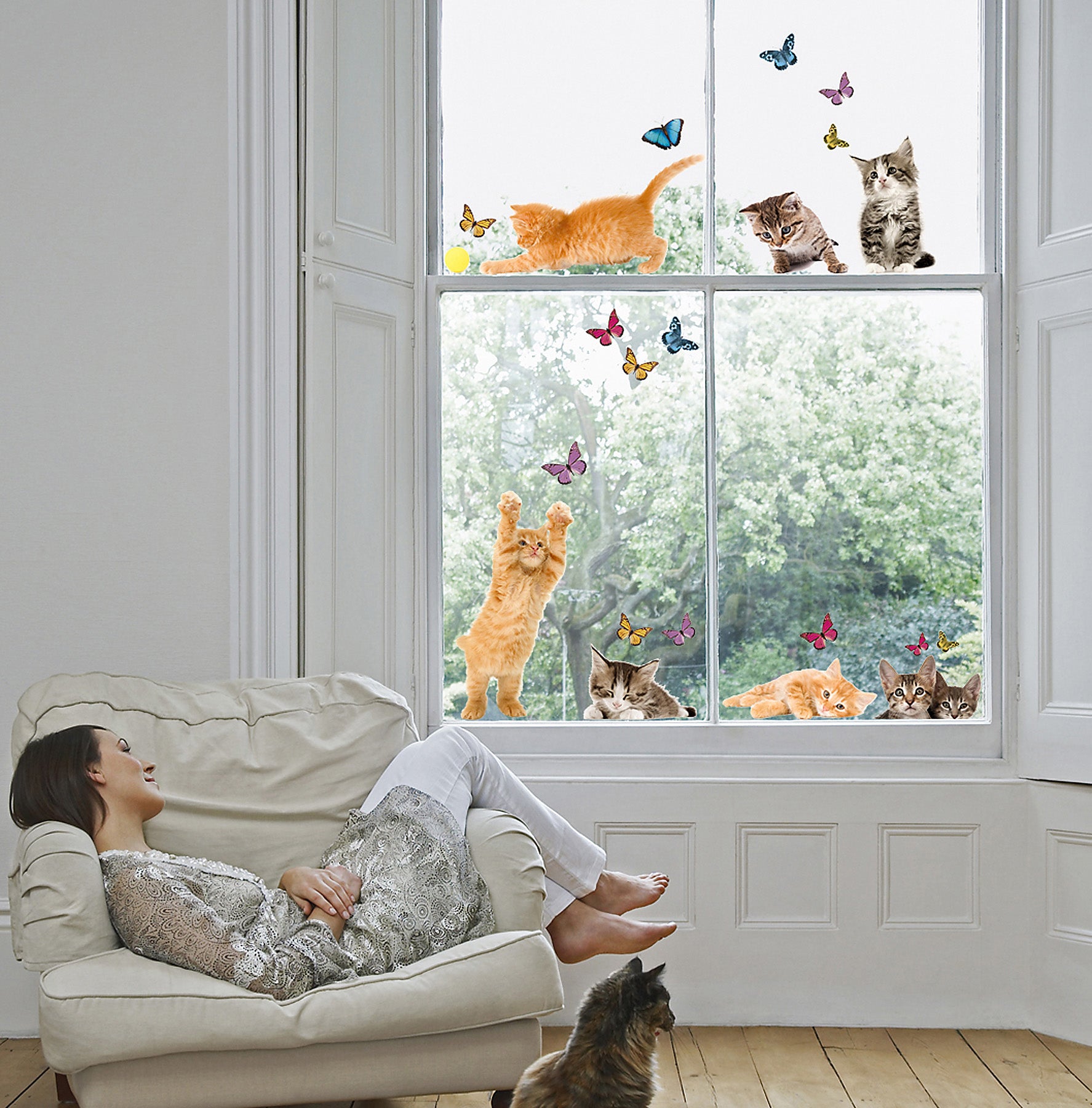 Playful Cats & Butterflies Window Stickers in a room setting