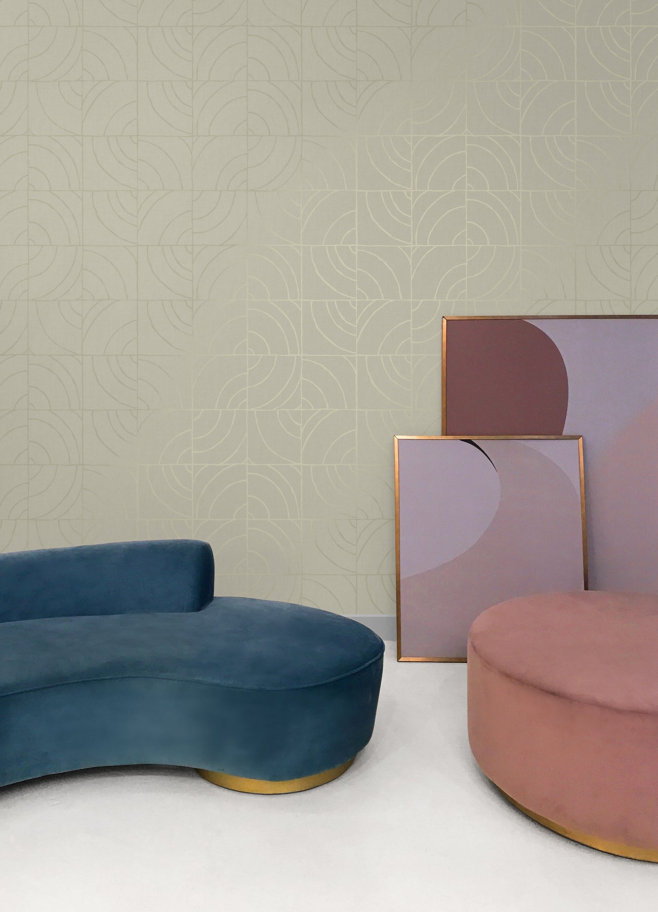 A person’s hands peel back a corner of WallPops Egypt Sherrod Batik Blok Peel and Stick Wallpaper, featuring abstract curved lines on a beige background, revealing its adhesive backing. The wallpaper rests on a wooden surface, and the person wears a ring on their left hand.