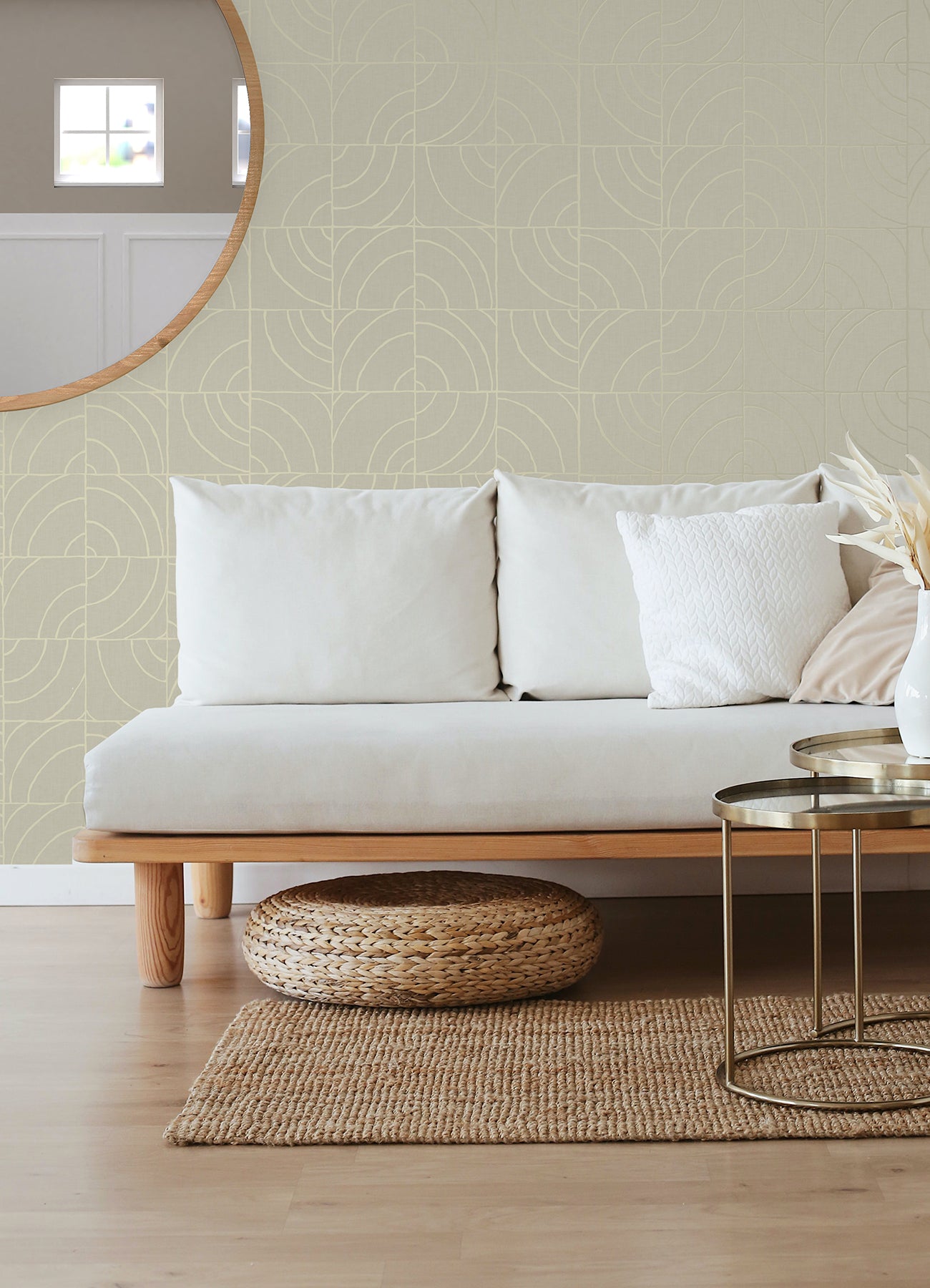 A person’s hands peel back a corner of WallPops Egypt Sherrod Batik Blok Peel and Stick Wallpaper, featuring abstract curved lines on a beige background, revealing its adhesive backing. The wallpaper rests on a wooden surface, and the person wears a ring on their left hand.