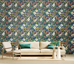 The Hoopla Walls Oasis Peel and Stick Wallpaper by WallPops features a seamless floral pattern with large white hibiscus, vivid orange tropical flowers, and assorted green, yellow, and peach leaves layered over a deep blue background for a vibrant, lush botanical look.