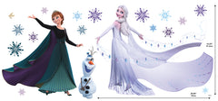 WallPops Frozen 2 Anna, Elsa, and Olaf Purple Wall Decals feature Anna in a black cape and green dress beside Olaf the snowman and Elsa with her shimmering gown among purple and blue snowflakes, a bird, and rustic accents on a white background.