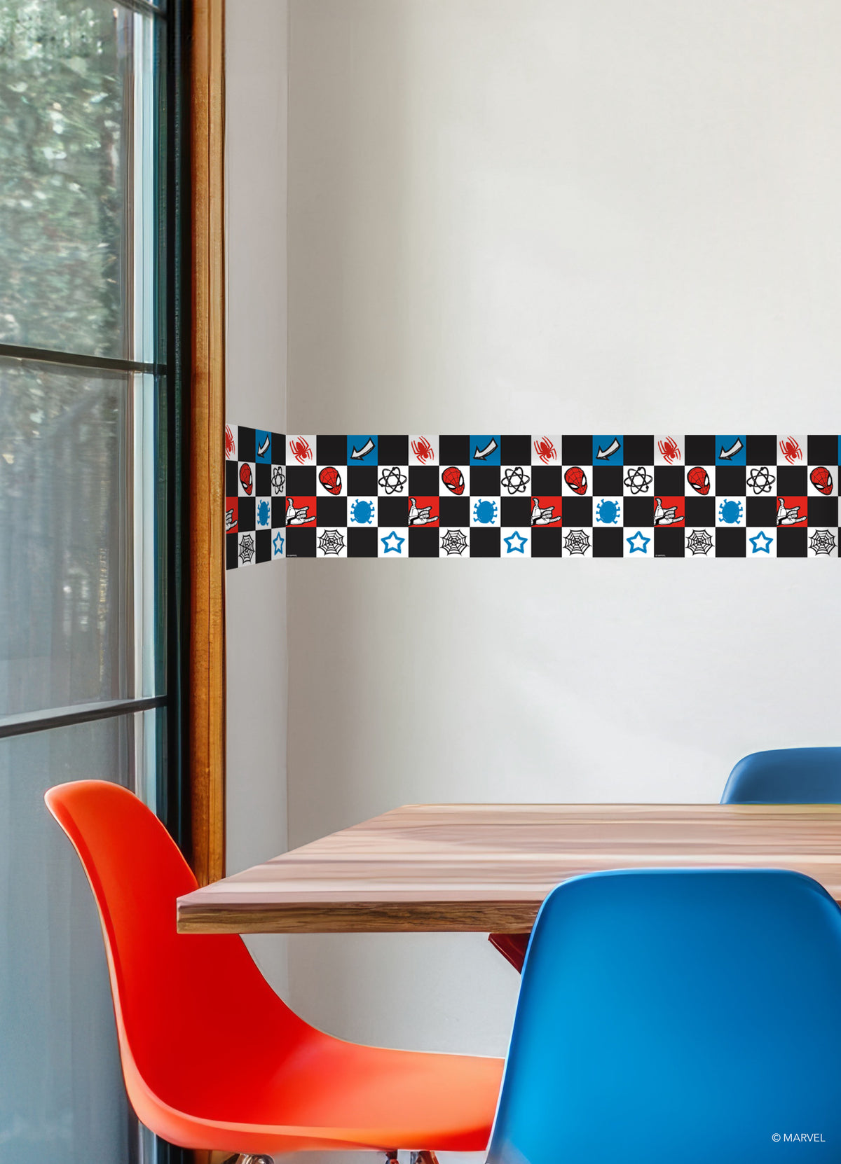 Spider-Man Checker Borders by WallPops features a dynamic checkerboard pattern with Spider-Man heads, red spiders, blue virus icons, comic-style arrows, white stars, web-shooting hands, black atom symbols, and webs across bold black, white, blue, and red squares. Inspired by rustic elements and distressed barn wood textures for enhanced character and style, this eye-catching peel-and-stick border brings a pop-art vibe to any space.