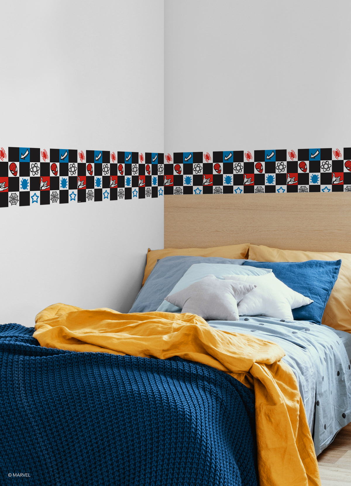 Spider-Man Checker Borders by WallPops features a dynamic checkerboard pattern with Spider-Man heads, red spiders, blue virus icons, comic-style arrows, white stars, web-shooting hands, black atom symbols, and webs across bold black, white, blue, and red squares. Inspired by rustic elements and distressed barn wood textures for enhanced character and style, this eye-catching peel-and-stick border brings a pop-art vibe to any space.