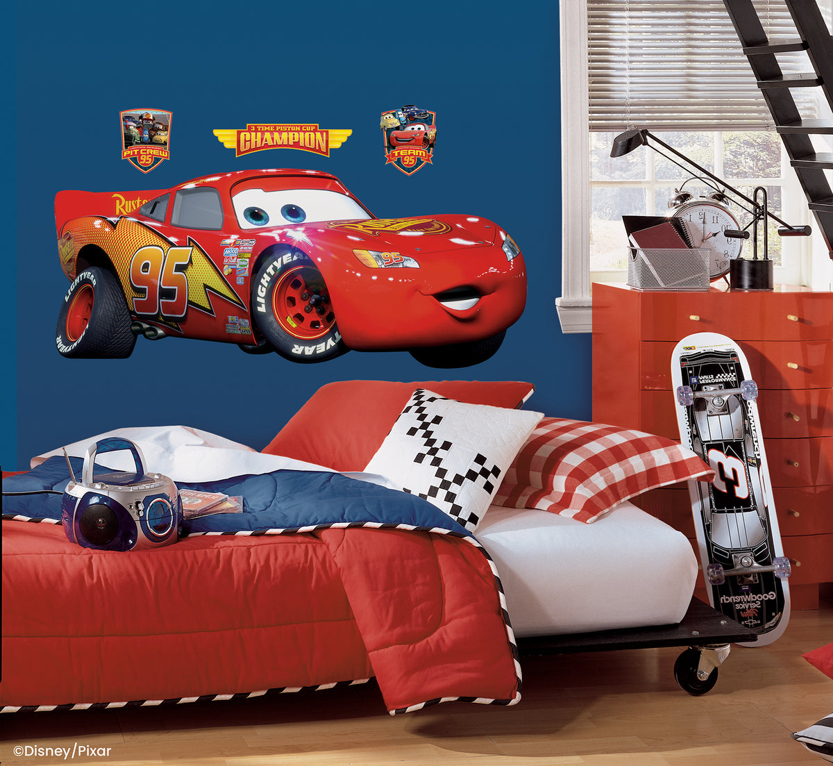 WallPops Cars - Lightening Mcqueen Peel & Stick Giant Wall Decal featuring a red race car with a friendly expression, blue eyes, number 95, a lightning bolt, and sponsor logos in a rustic design.