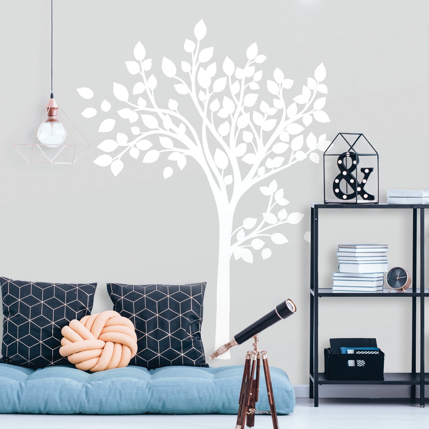 Featuring an illustration of three stylized tree branches with leaves—scattered and overlapping on a white background—Simple Tree Peel and Stick Giant Wall Decals by WallPops showcases a minimalistic design. Bold, clean white lines and shapes are used to depict the branches and leaves, resulting in an intricate, natural pattern that beautifully complements rustic décor like distressed barn wood or fits seamlessly with modern wall decal styles.