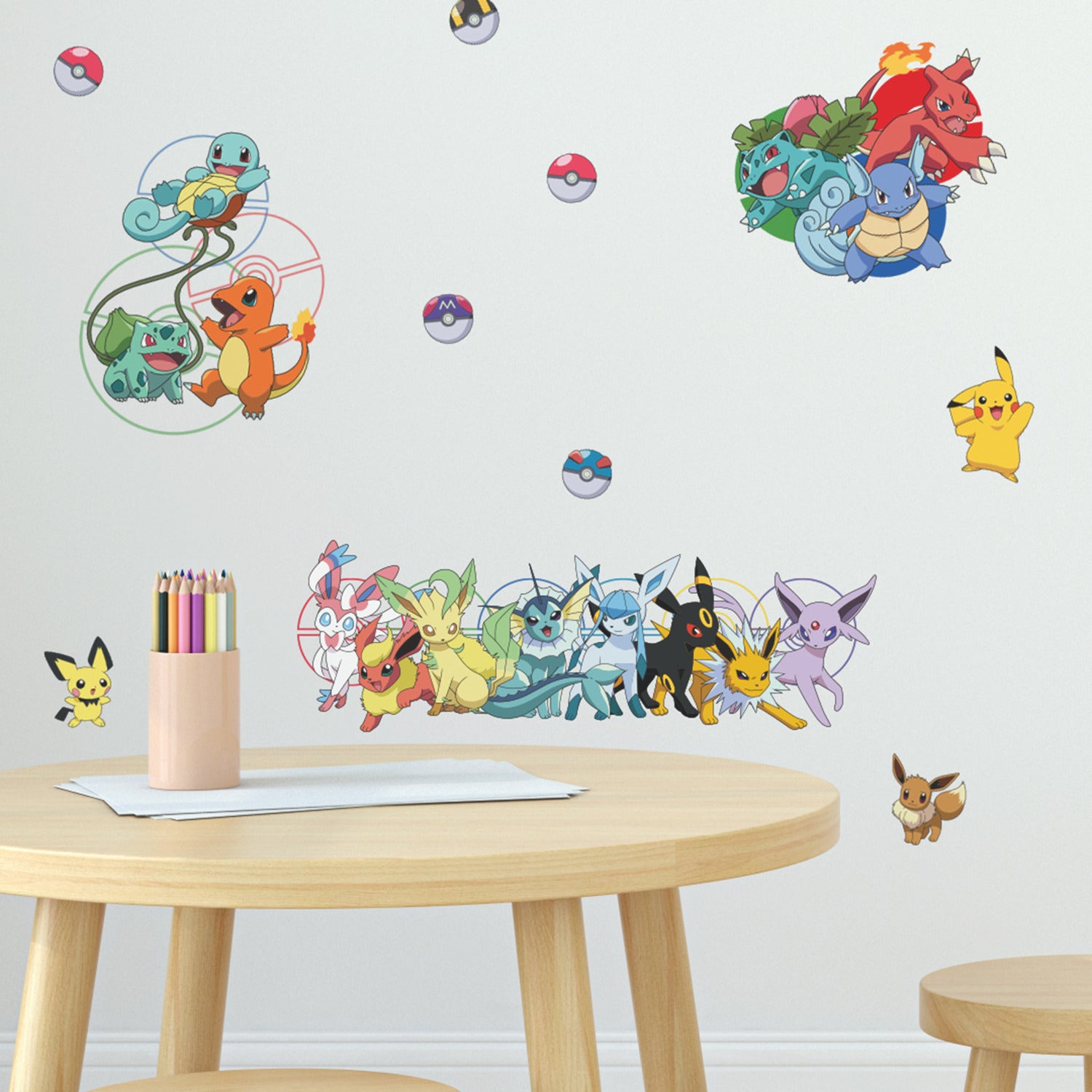 Bring your love for Pokémon to life with WallPops Pokémon Favorite Character Wall Decals! Pikachu, Bulbasaur, Charmander, Meowth, Eevee, and other colorful Pokémon are playfully arranged across a crisp white background with Poké Balls and clusters of evolved forms decorating the corners. Rustic barn wood-inspired details add a unique touch to this vibrant wall display—a perfect peel-and-stick solution for any fan’s space.