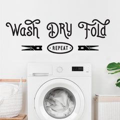 Wash Dry Fold Repeat Wall Decals in a room setting