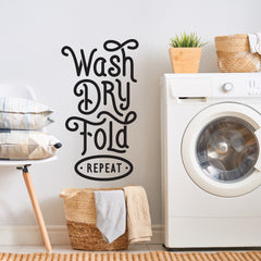 Wash Dry Fold Repeat Wall Decals in a room setting