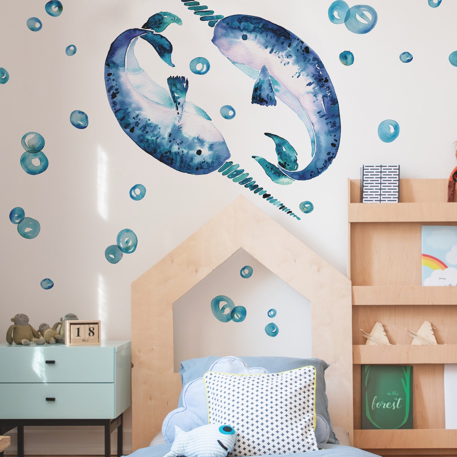 Bring an artistic touch to your space with the Cat Coquillette Narwhal Giant Peel and Stick Wall Decals by WallPops. This charming set features two watercolor narwhals with blue speckles and long spiral tusks facing each other. Dimension arrows highlight their size—standing 44.59 inches 1.1 m tall and 29.24 inches 74.27 cm wide—while four key points are marked with numbered black circles for easy placement. Their gentle hues make these giant decals a delightful, hassle-free accent to any room.