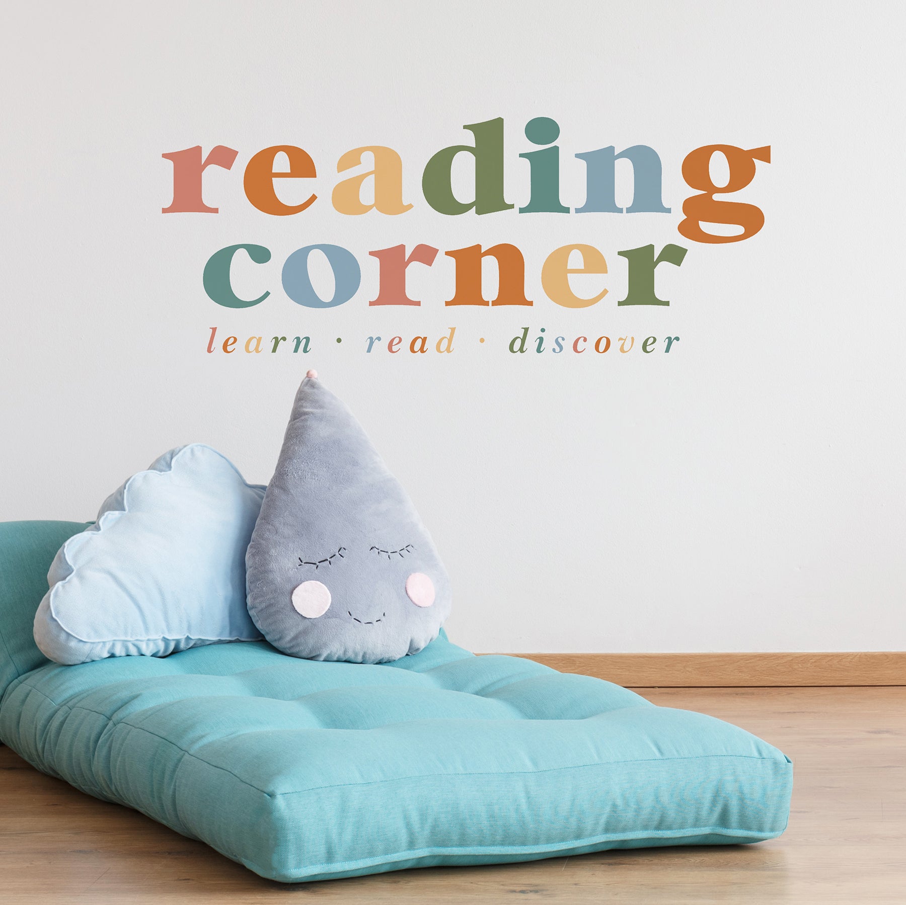 Create an inviting classroom reading nook with the Reading Corner Multicolor Wall Quote Decals by WallPops. Featuring vibrant Reading Corner text above the inspiring words learn · read · discover, these easy-to-apply peel and stick decals are perfect for your space. The set includes a vertical arrow 36.47 cm and a horizontal arrow 90.27 cm, all on a crisp white background, making it simple to mark your reading corner in style.