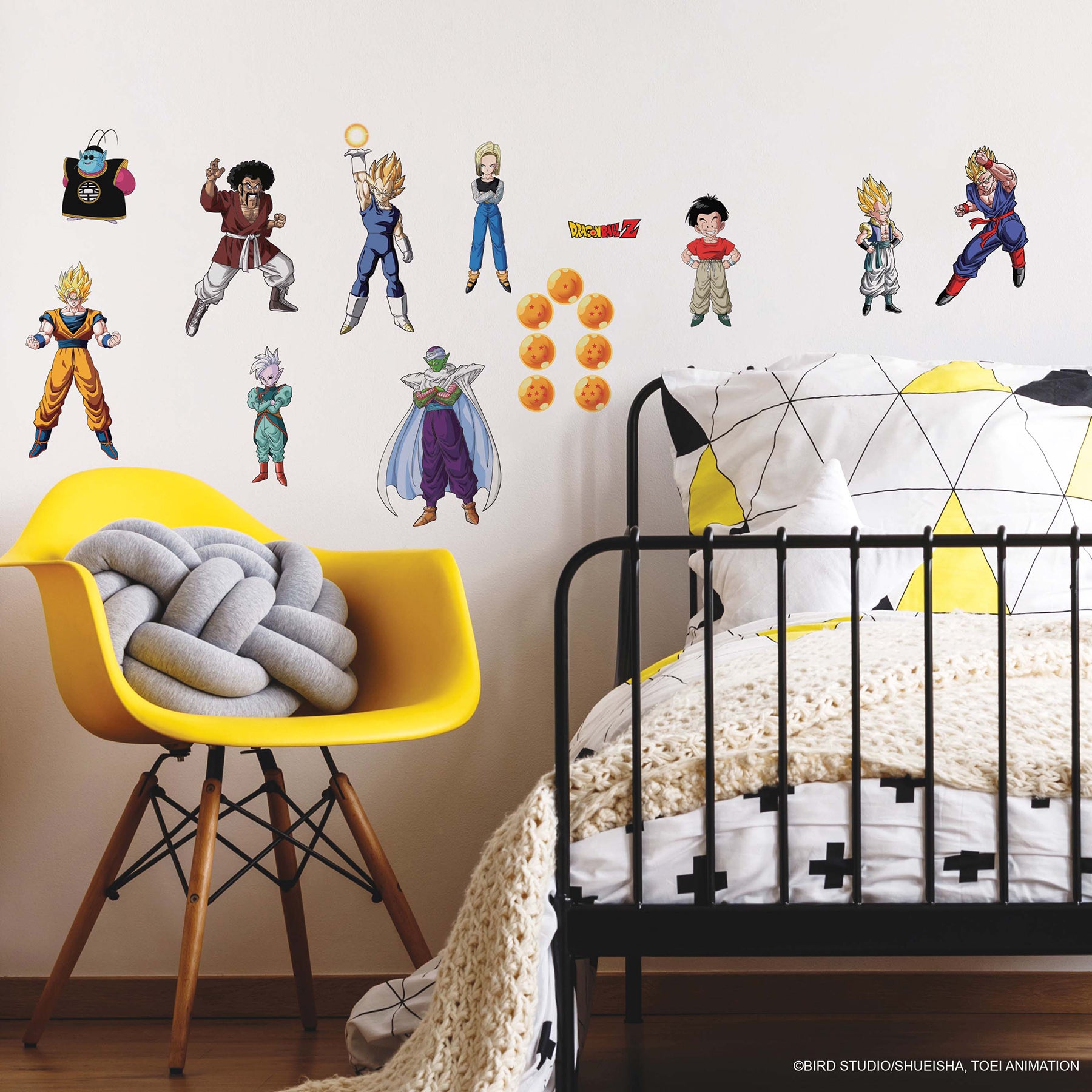 Add a dynamic touch to any room with the WallPops Dragon Ball Z Characters Wall Decals. This box includes 26 peel and stick character stickers, featuring Dragon Balls and an array of Dragon Ball Z favorites. The packaging highlights Super Saiyan Goku on the front, while smaller images showcase multiple characters and the decals displayed above a yellow chair and desk—no farmhouse flair or DIY expertise required!.
