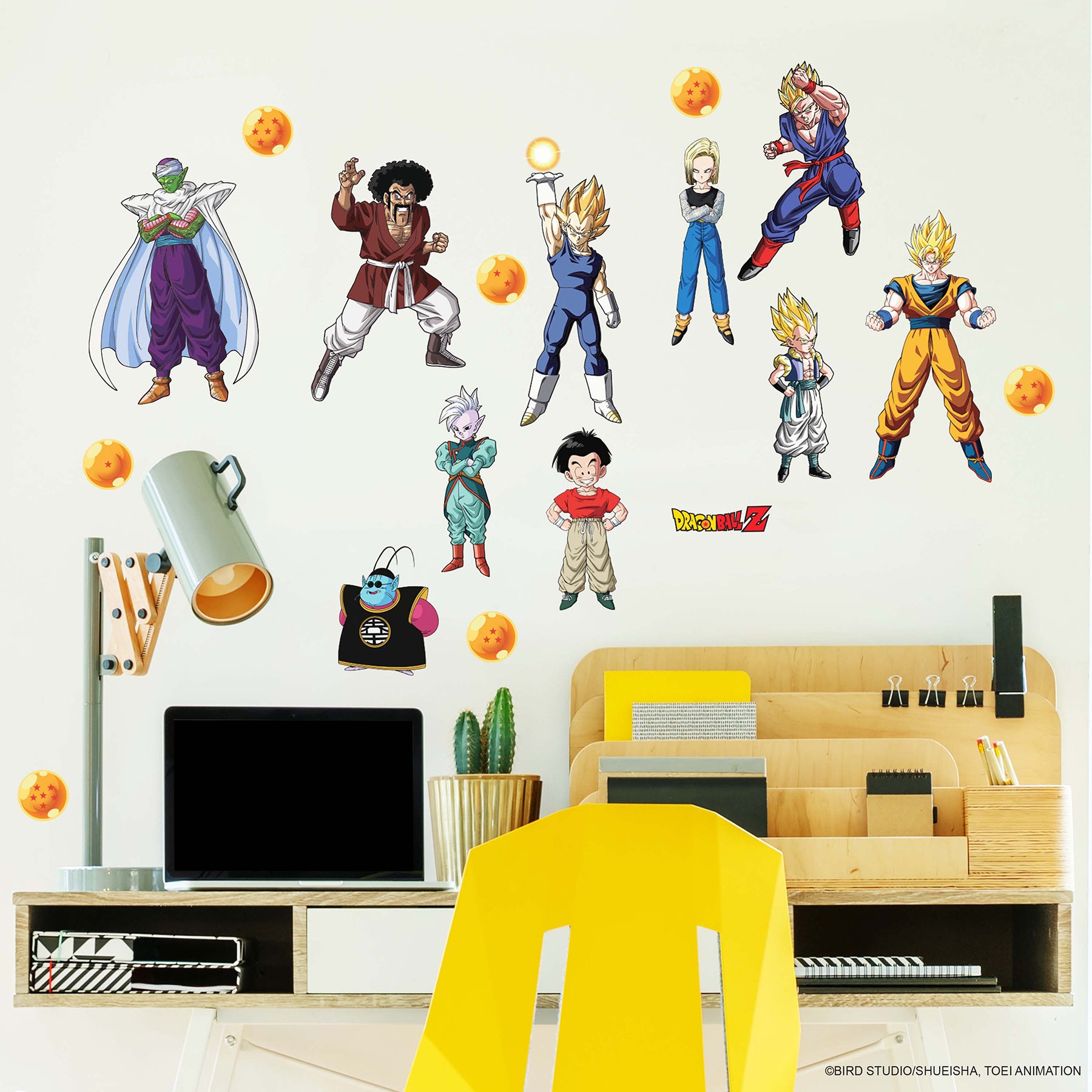 Add a dynamic touch to any room with the WallPops Dragon Ball Z Characters Wall Decals. This box includes 26 peel and stick character stickers, featuring Dragon Balls and an array of Dragon Ball Z favorites. The packaging highlights Super Saiyan Goku on the front, while smaller images showcase multiple characters and the decals displayed above a yellow chair and desk—no farmhouse flair or DIY expertise required!.