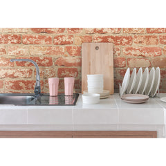 Stuccoed Brick Peel and Stick Wallpaper in a room setting