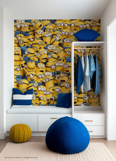 A lively scene from the Universal Studios Minions One in a Minion Peel and Stick Mural by WallPops shows a crowd of small yellow Minions—complete with goggles, blue overalls, and unique expressions—gathered closely together. Some are grinning, others appear surprised or are calling out, all adding to the playful and chaotic energy of this mural.