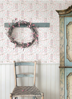 Introducing the Cowgirl Like Me Peel and Stick Wallpaper by WallPops—this seamless wallpaper showcases pale beige cowboy boots accented with delicate floral motifs, all arranged against a light backdrop interwoven with winding leafy vines and dainty blossoms. The soft, muted illustration style lends a subtle vintage charm, making it the ideal choice for anyone seeking adorable cowgirl-inspired décor.