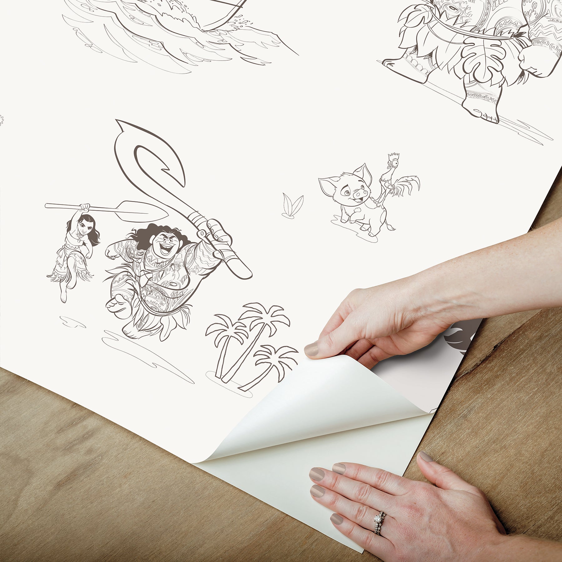 Bring the adventurous spirit of Moana to your space with the Disney Moana Line Art Peel and Stick Wallpaper from WallPops. Featuring playful, sketch-like illustrations of Moana, Maui, and other favorite characters—sailing a boat, holding a fishhook, exploring islands, and joined by a rooster and pig—this removable wallpaper is easy to apply on a light background for an uplifting touch to any room.
