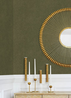 A close-up view of a cork board surface reveals a natural, subtly uneven texture composed of tiny light to medium brown granules pressed together. This organic look would beautifully complement WallPops’ RuPaul RuSuede Peel and Stick Wallpaper or pair seamlessly with other azure blue wallcoverings for easy and stylish customization. The surface is shown free from any objects, pins, or text.